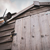 HomeOK smart home camera mounted on a shed